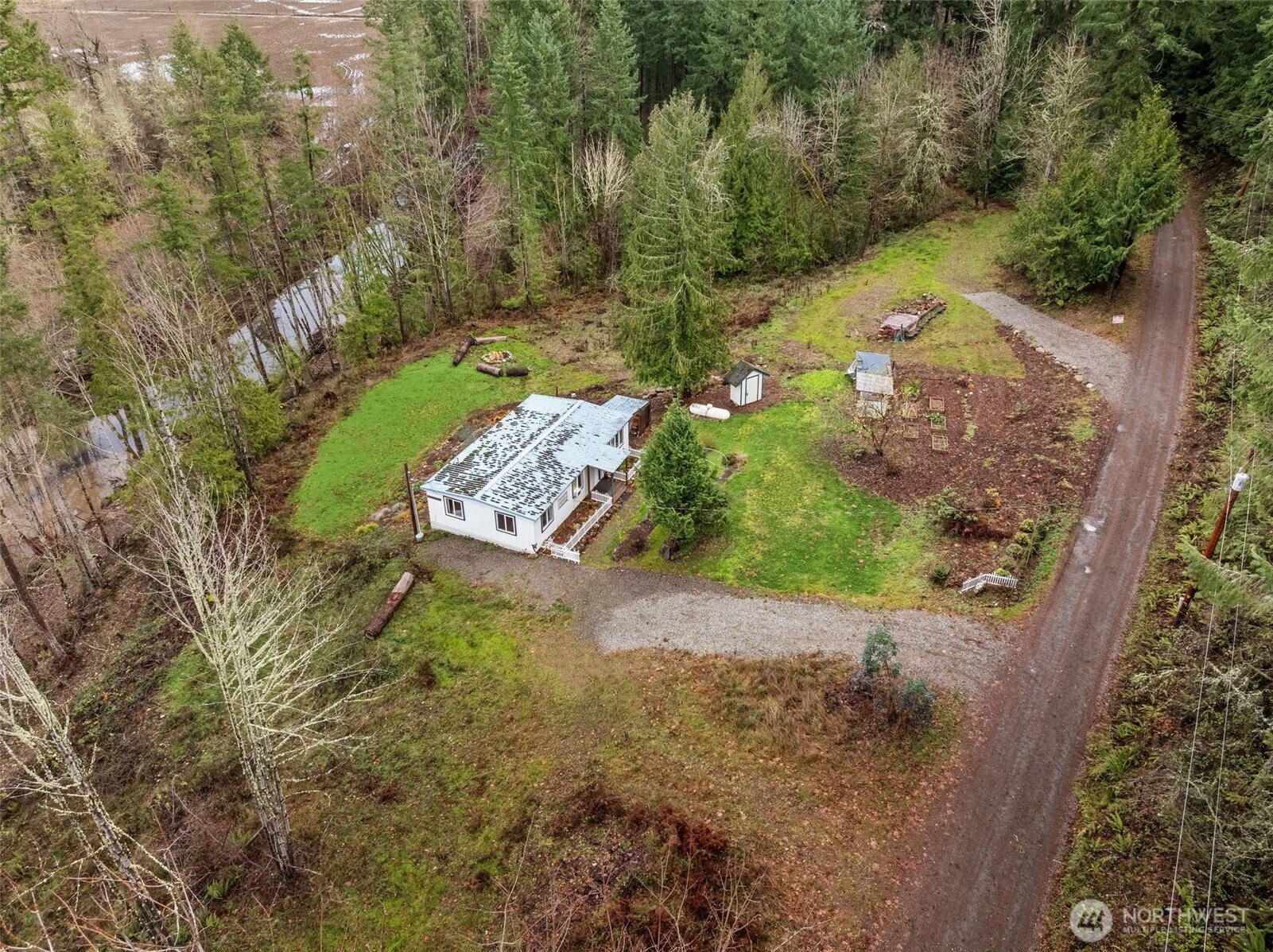 18818 Slough Lane Southeast Yelm, WA 98597 - Photo 33 of 39 a view of a yard with plants