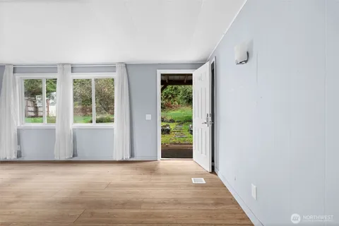 a view of a room with a large window