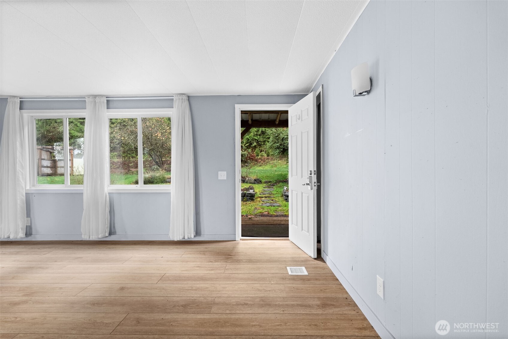 18818 Slough Lane Southeast Yelm, WA 98597 - Photo 4 of 39 a view of a room with a large window