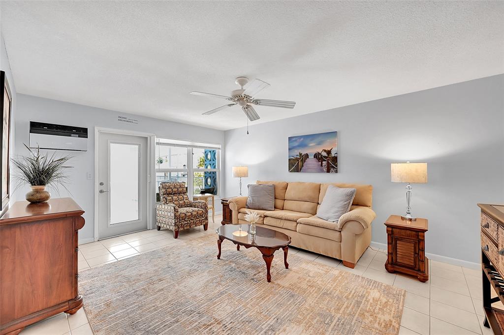 1110 North Riverside Drive, Unit 27 Pompano Beach, FL 33062 - Photo 25 of 52 Being Sold Furnished, Turn-Key. Impact Windows & Doors also include Blinds and Retractable Screen Doors! Your Living Room, Dining Area are Bright, Spacious and Great for Quiet Times or Entertaining!