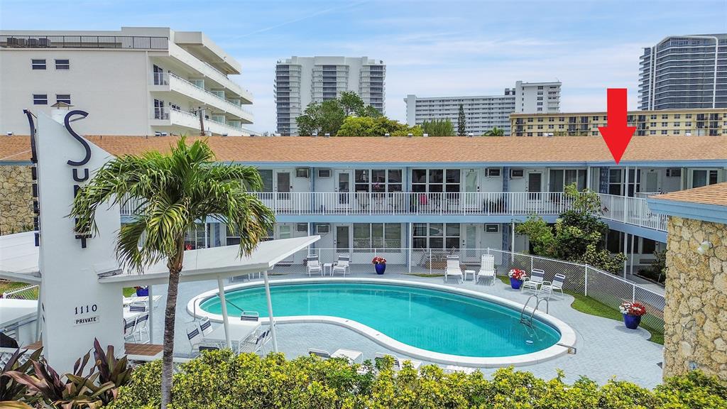 1110 North Riverside Drive, Unit 27 Pompano Beach, FL 33062 - Photo 3 of 52 This Second Floor Poolside Retreat Boasts Impact Windows & Doors, Retractable Screen Door, Three Friedrich A/C units (One with Heat, 2023 & 2024), 2012 Water Heater, & Ceramic Tile and Oak Laminate Floors.