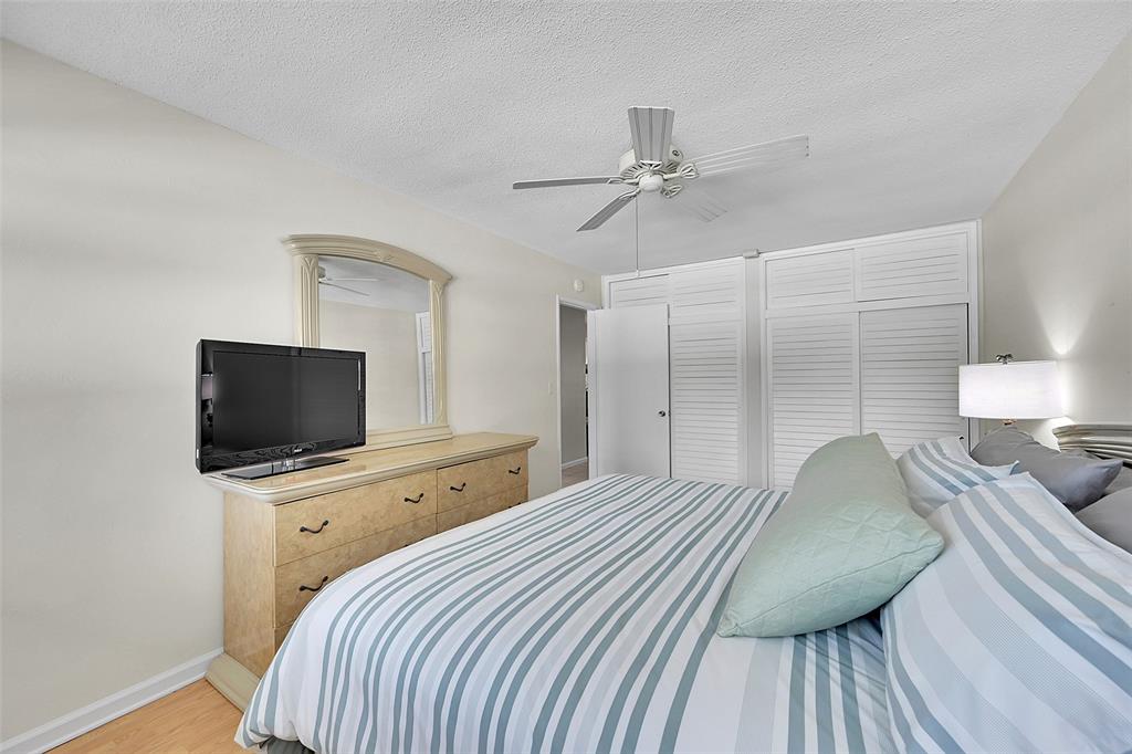 1110 North Riverside Drive, Unit 27 Pompano Beach, FL 33062 - Photo 38 of 52 Primary Bedroom was Just Freshly Painted. Being Sold Furnished and Turn-Key. Primary Bedroom includes a King Sized Bedroom Suite and lots of Closet Space!