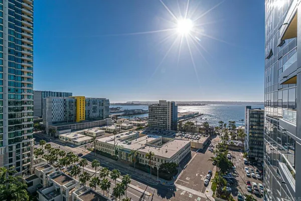 a view of a balcony with a table and chairs