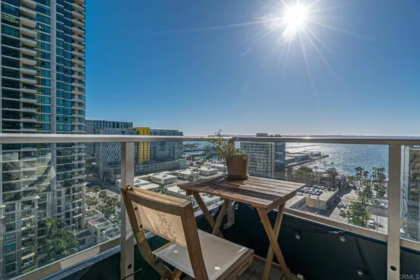 a view of balcony with furniture