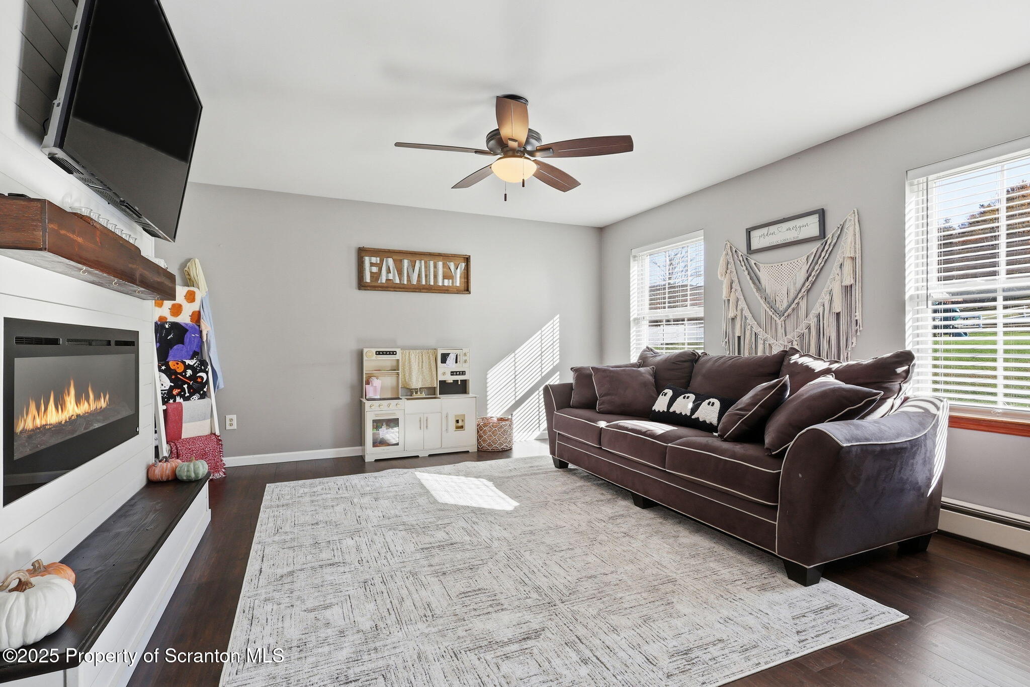 918 Jones Road Union Dale, PA 18470 - Photo 19 of 65 a living room with furniture and a flat screen tv