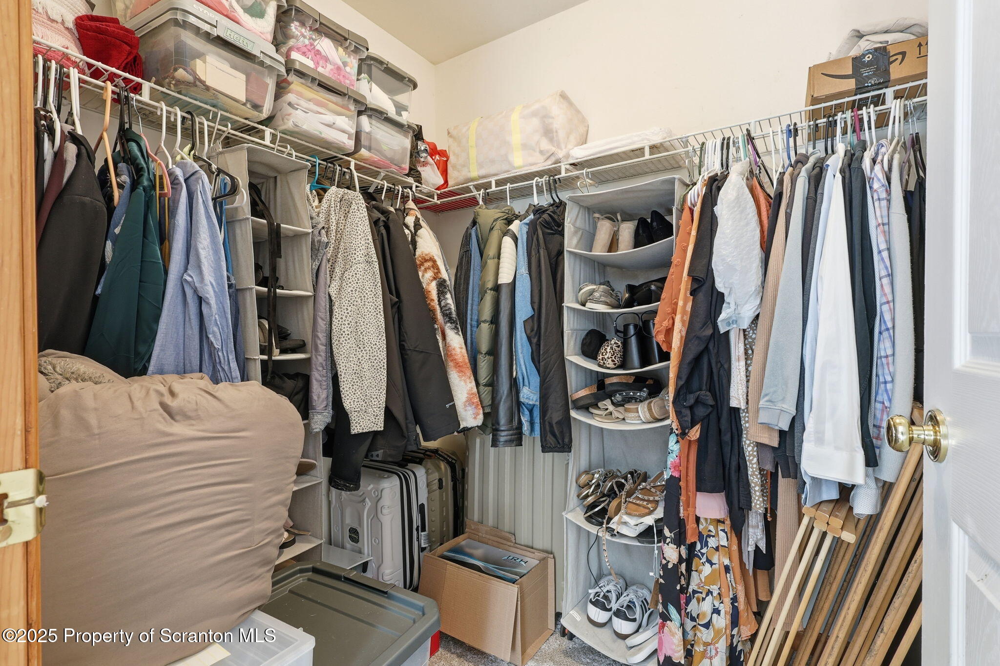 918 Jones Road Union Dale, PA 18470 - Photo 38 of 65 a view of walk in closet with clothes and shoes