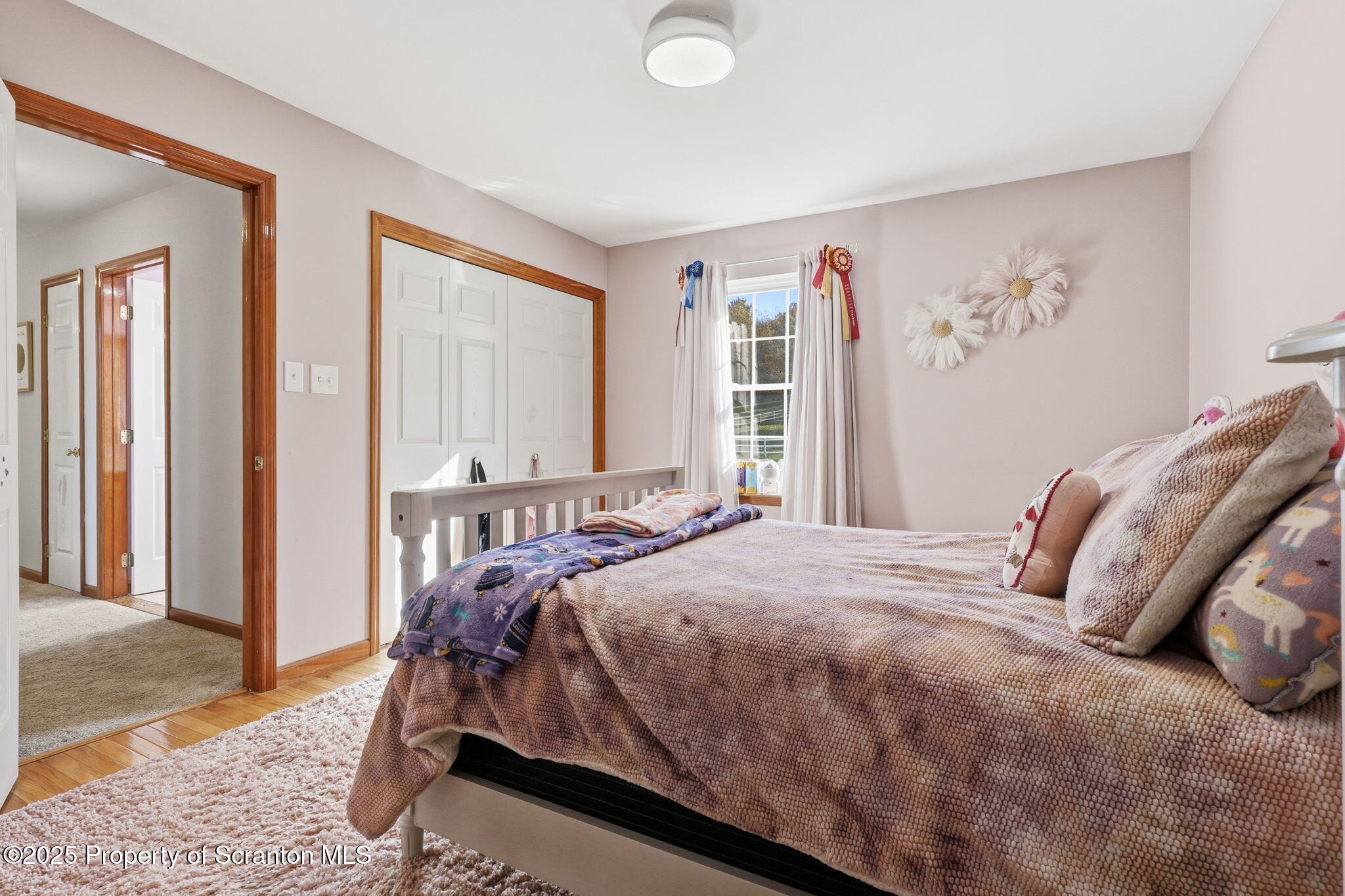 918 Jones Road Union Dale, PA 18470 - Photo 39 of 65 a bedroom with a large bed and a window