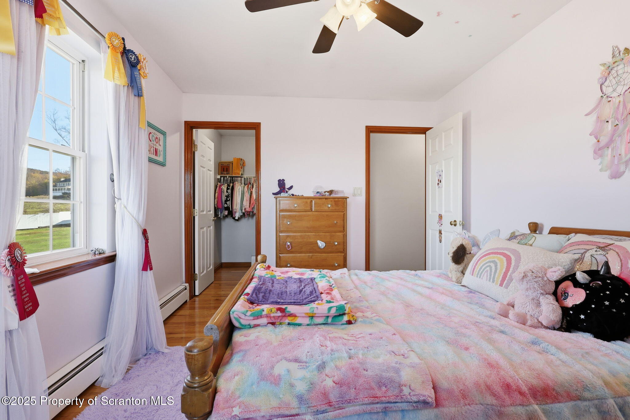 918 Jones Road Union Dale, PA 18470 - Photo 44 of 65 a bedroom with a bed and a dresser