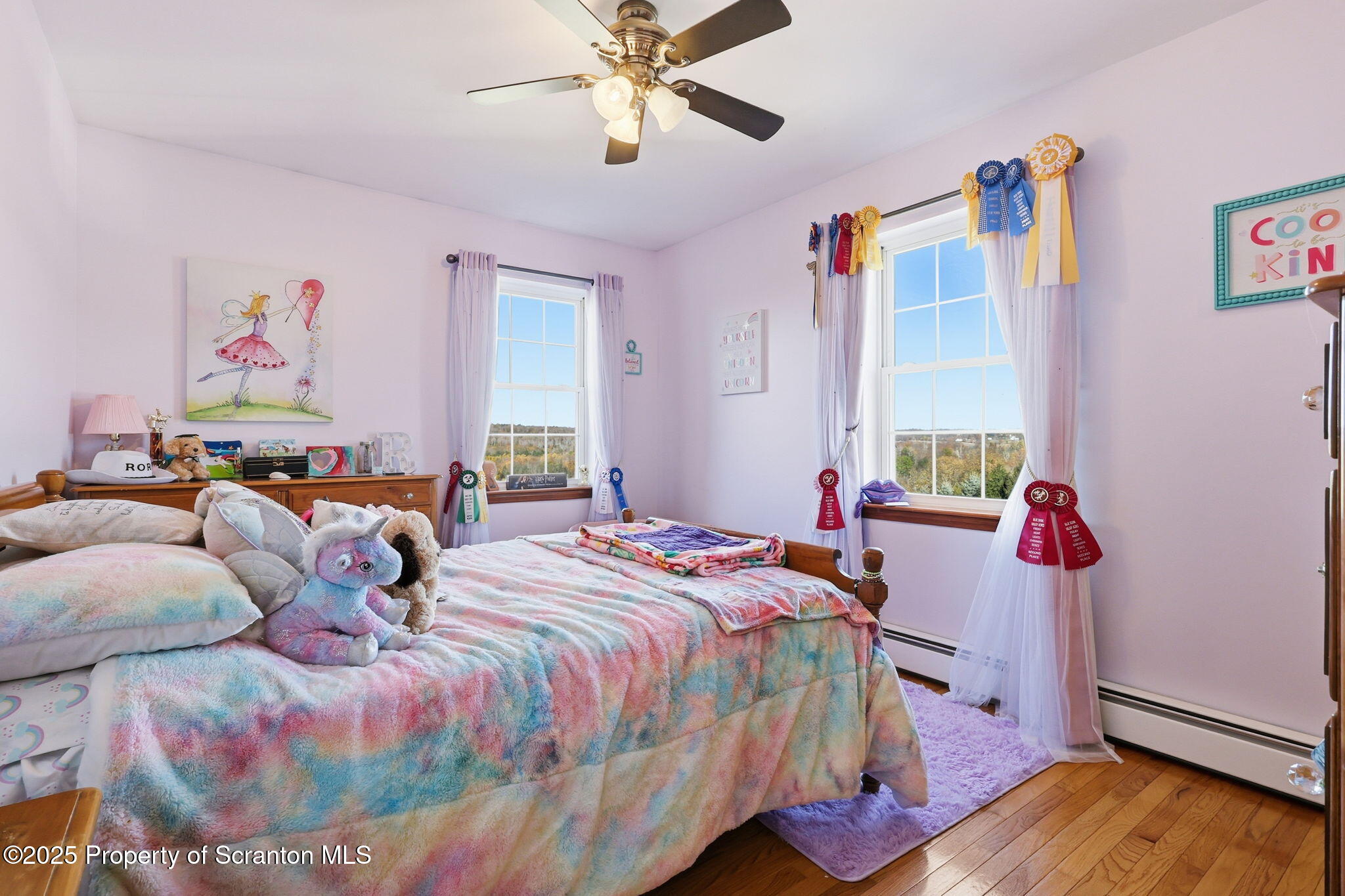 918 Jones Road Union Dale, PA 18470 - Photo 45 of 65 a bedroom with a bed and wooden floor