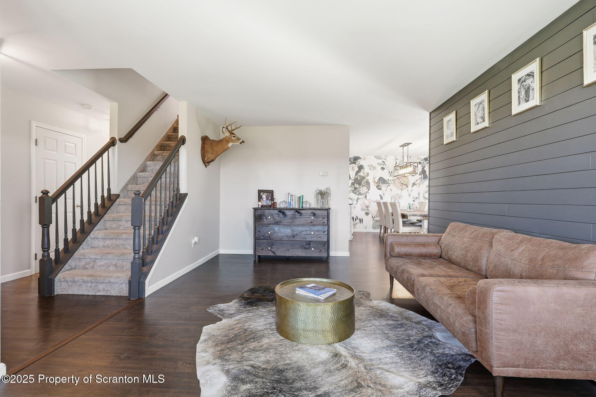 918 Jones Road Union Dale, PA 18470 - Photo 10 of 65 a living room with furniture and a potted plant