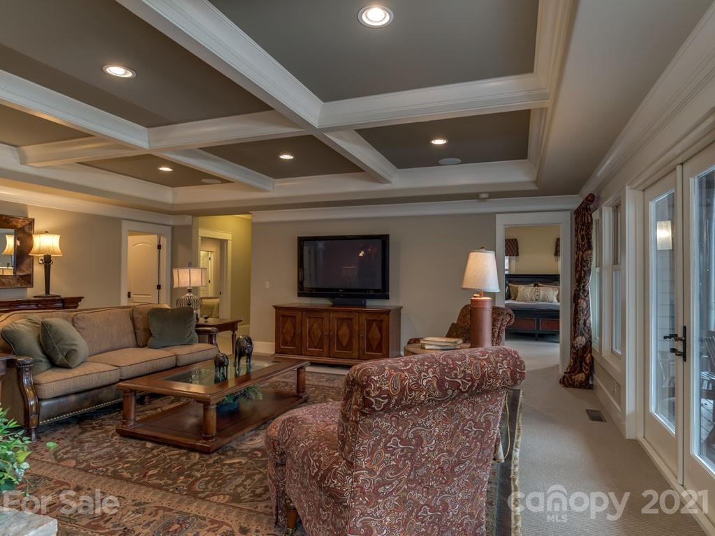 995 Deep Gap Farm Road East Mill Spring, NC 28756 - Photo 19 of 47 a living room with furniture and a flat screen tv