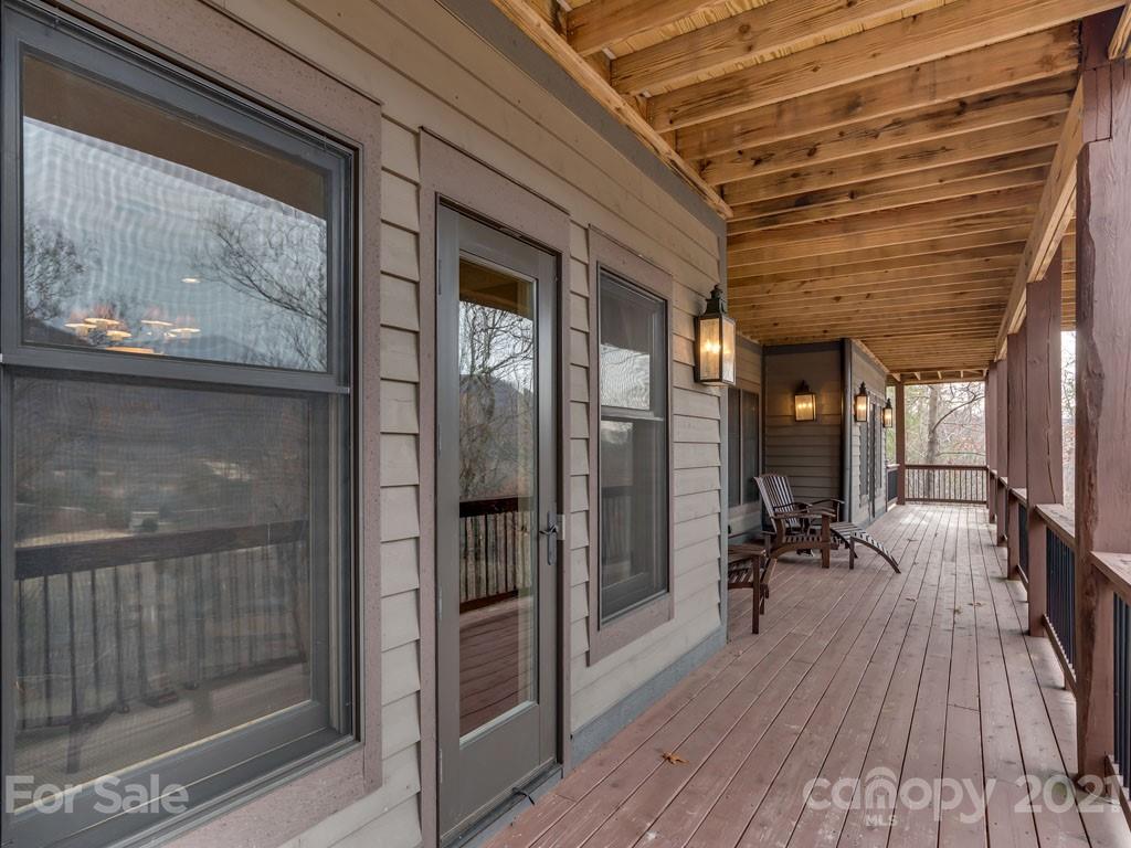 995 Deep Gap Farm Road East Mill Spring, NC 28756 - Photo 27 of 47 a view of dining room with wooden floor
