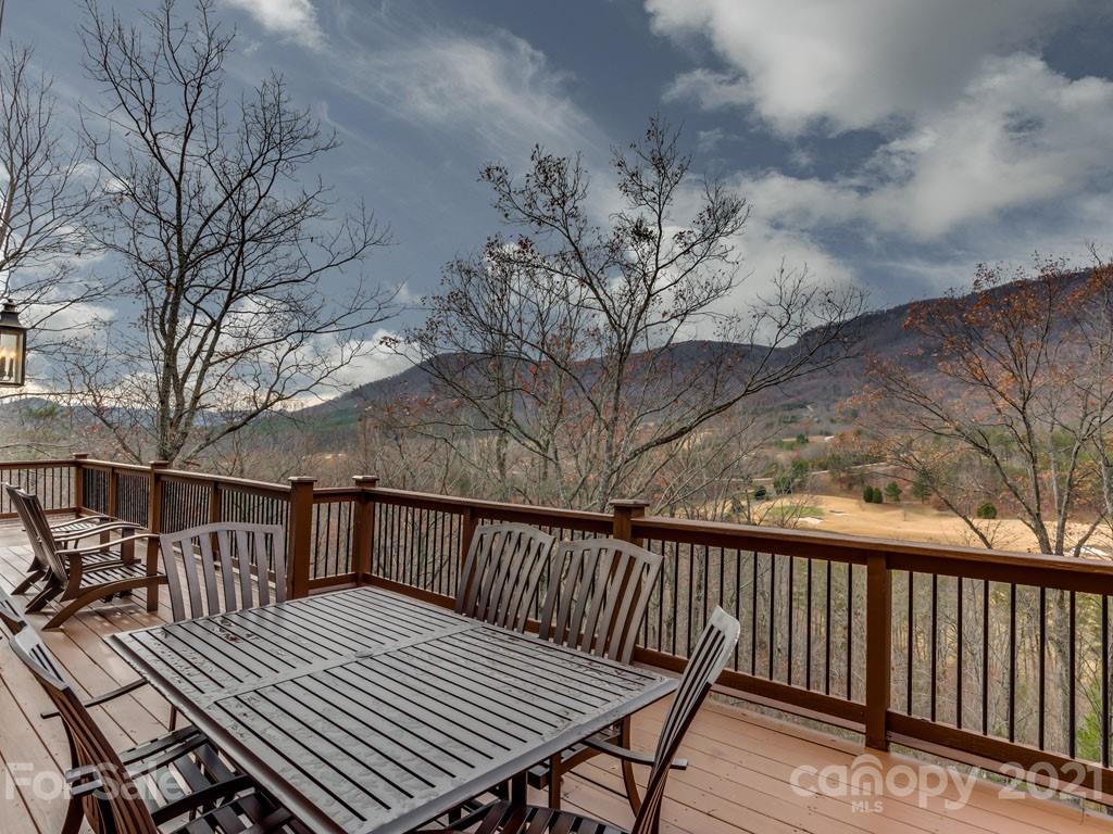 995 Deep Gap Farm Road East Mill Spring, NC 28756 - Photo 38 of 47 a view of balcony with wooden floor and fence