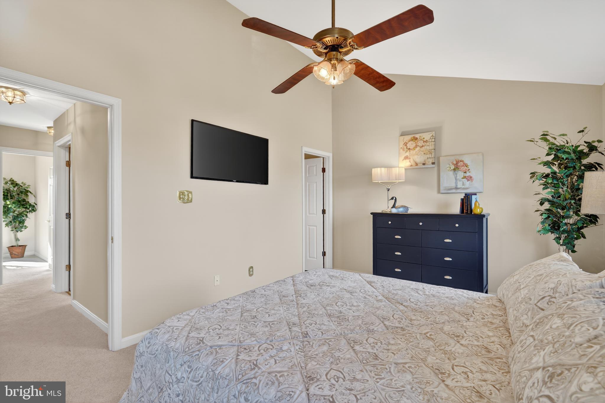 45590 Whitcomb Square Sterling, VA 20166 - Photo 22 of 43 a bedroom with a bed and a flat screen tv
