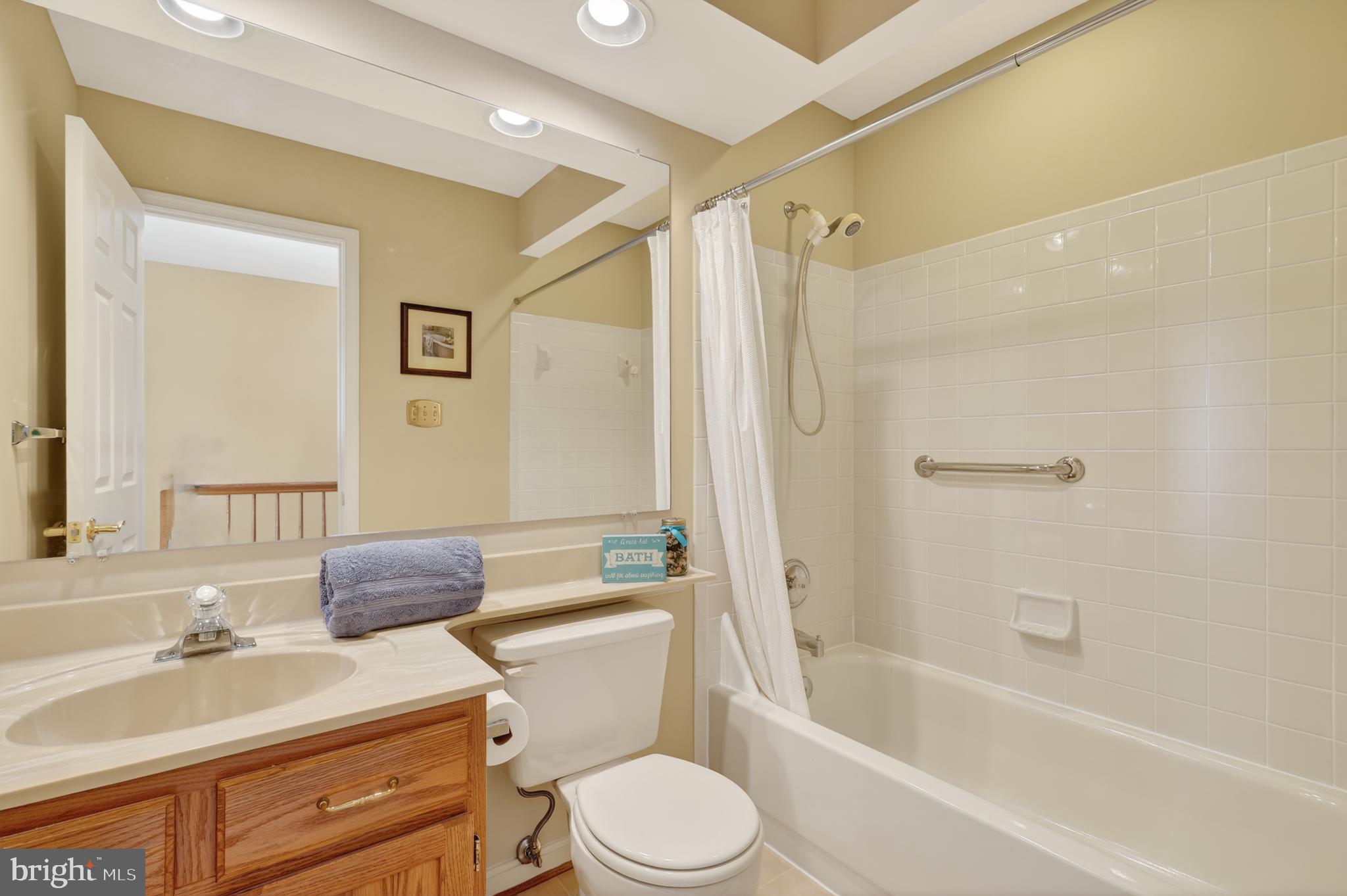 45590 Whitcomb Square Sterling, VA 20166 - Photo 28 of 43 a bathroom with a sink toilet and shower