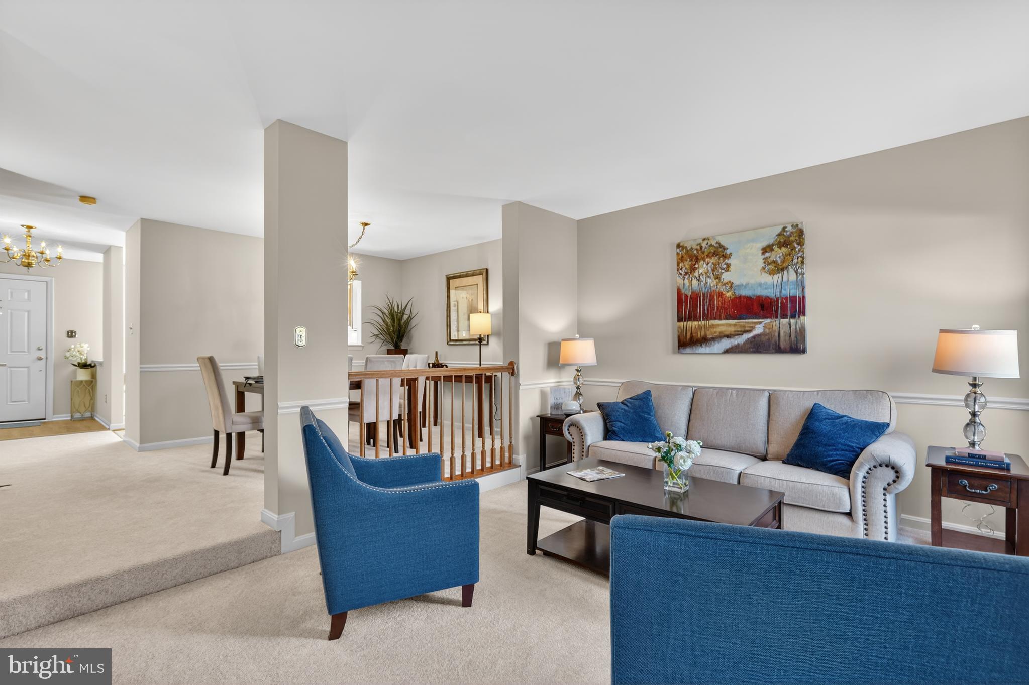 45590 Whitcomb Square Sterling, VA 20166 - Photo 3 of 43 a living room with furniture and a dining table