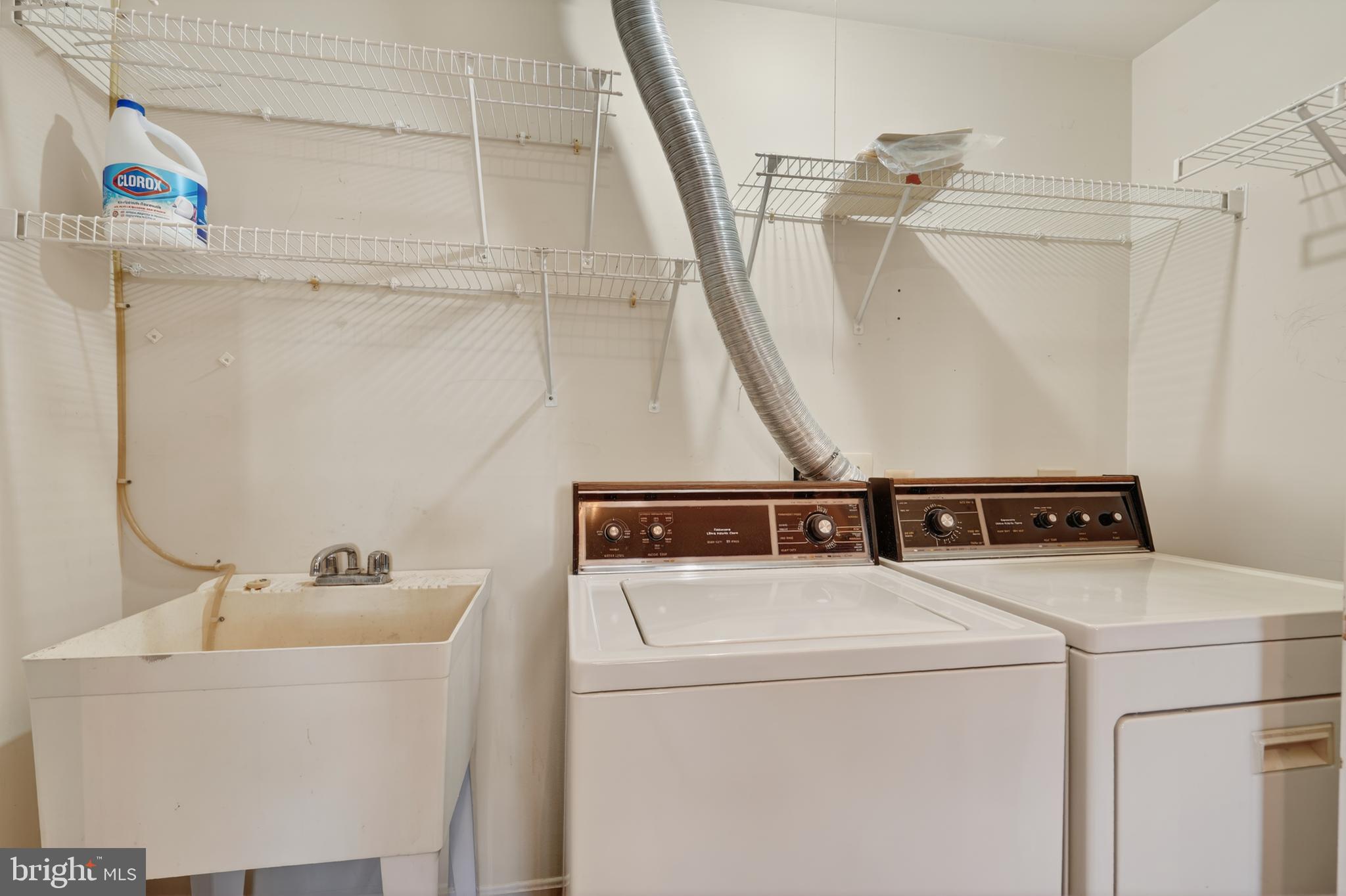 45590 Whitcomb Square Sterling, VA 20166 - Photo 34 of 43 a utility room with dryer and washer