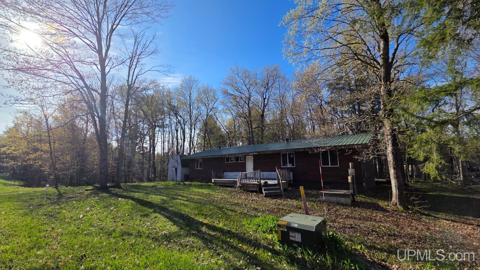 7122 Maple Grove Road Munising, MI 49862 - Photo 1 of 44