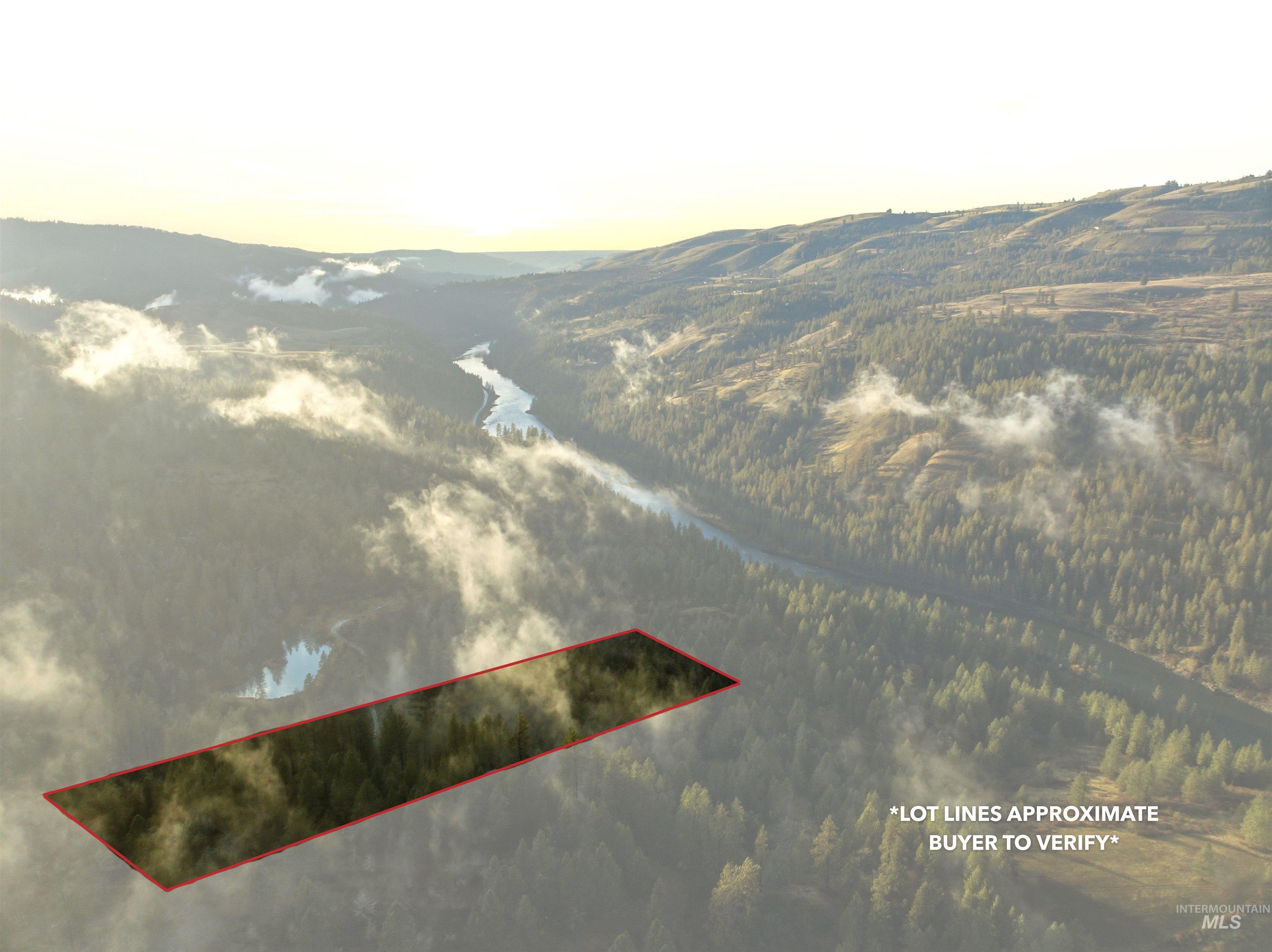 43705 Bobbitt Bench Road Peck, ID 83545 - Photo 10 of 11 Aerial view at dusk of property boundaries highlighted and a water and mountain view