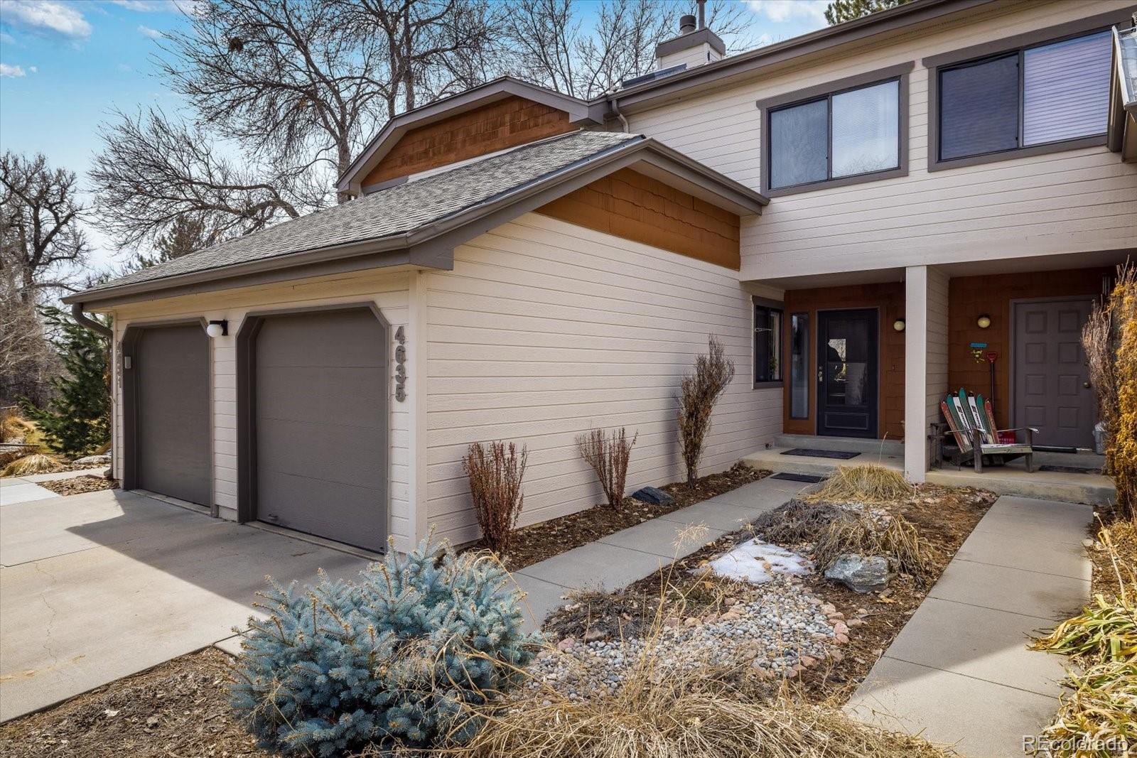 4635 Chestnut Lane, Unit 3 Boulder, CO 80301 - Photo 2 of 36 a view of a house with a yard