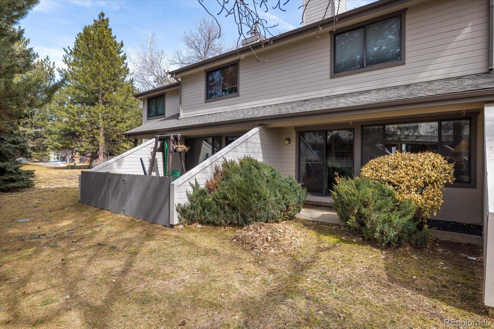 4635 Chestnut Lane, Unit 3 Boulder, CO 80301 - Photo 26 of 36 a view of a house with backyard and sitting area