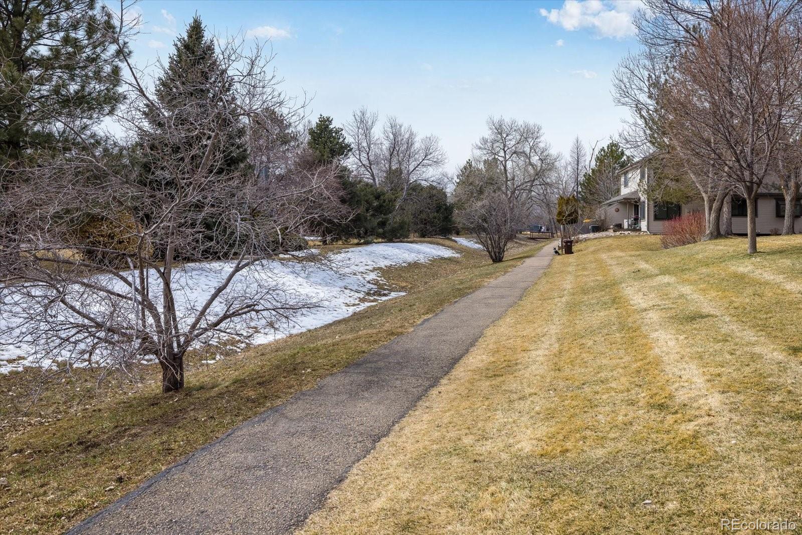 4635 Chestnut Lane, Unit 3 Boulder, CO 80301 - Photo 28 of 36 a view of a yard with trees