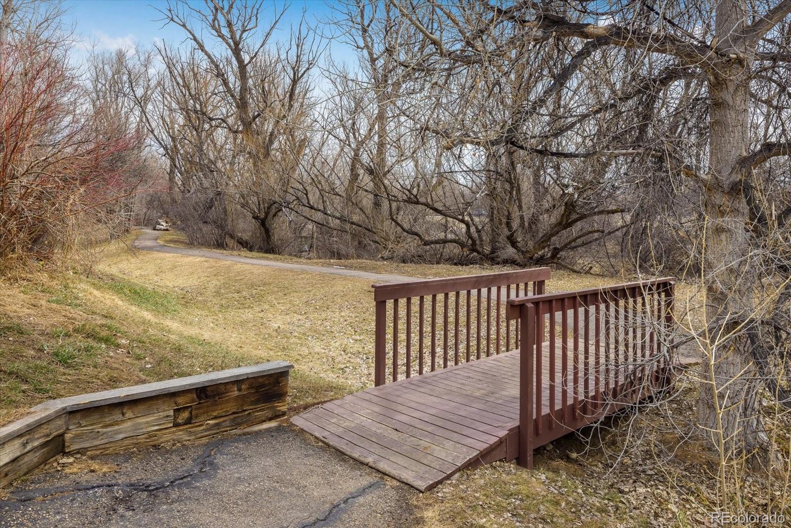 4635 Chestnut Lane, Unit 3 Boulder, CO 80301 - Photo 29 of 36 a view of wooden floor with a bench