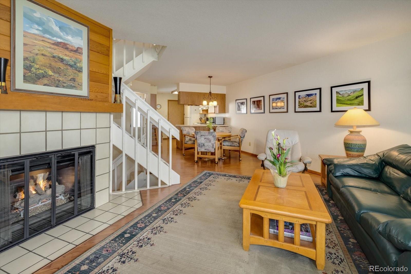 4635 Chestnut Lane, Unit 3 Boulder, CO 80301 - Photo 6 of 36 a living room with furniture and a fireplace
