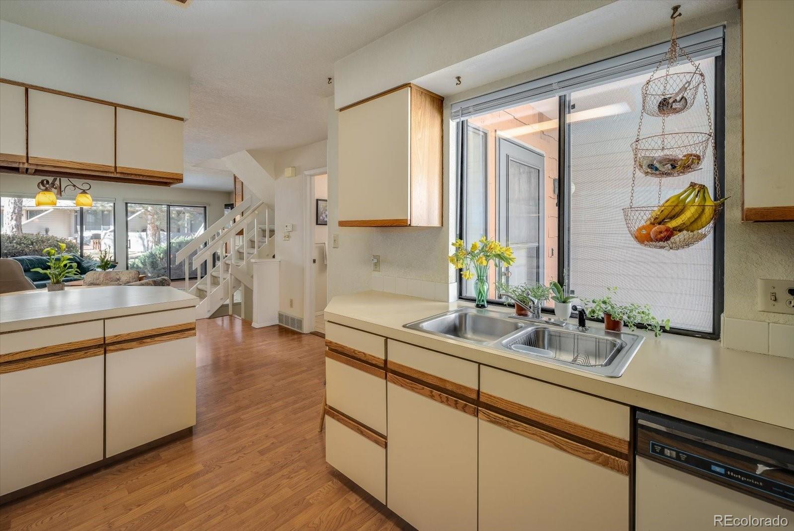 4635 Chestnut Lane, Unit 3 Boulder, CO 80301 - Photo 9 of 36 a kitchen with a sink and cabinets