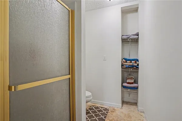 a bathroom with a tub sink and a mirror