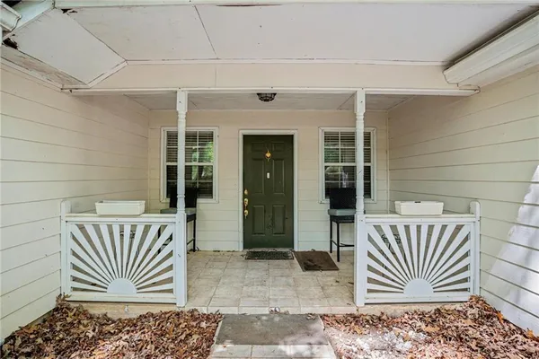 a view of wooden door and outdoor space