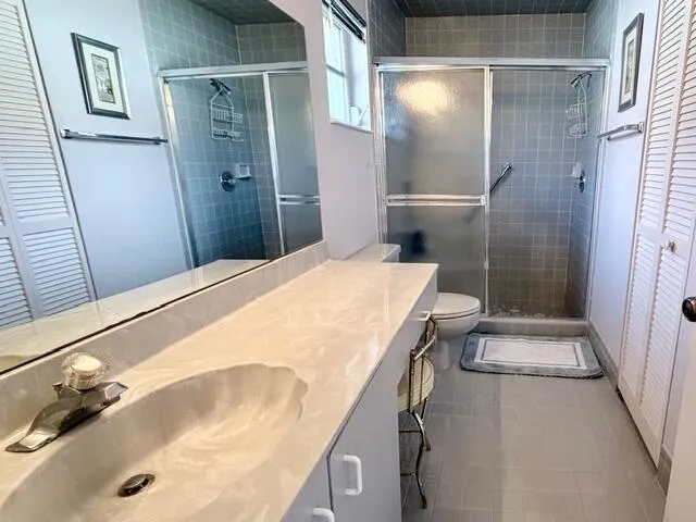 a bathroom with a tub and a shower