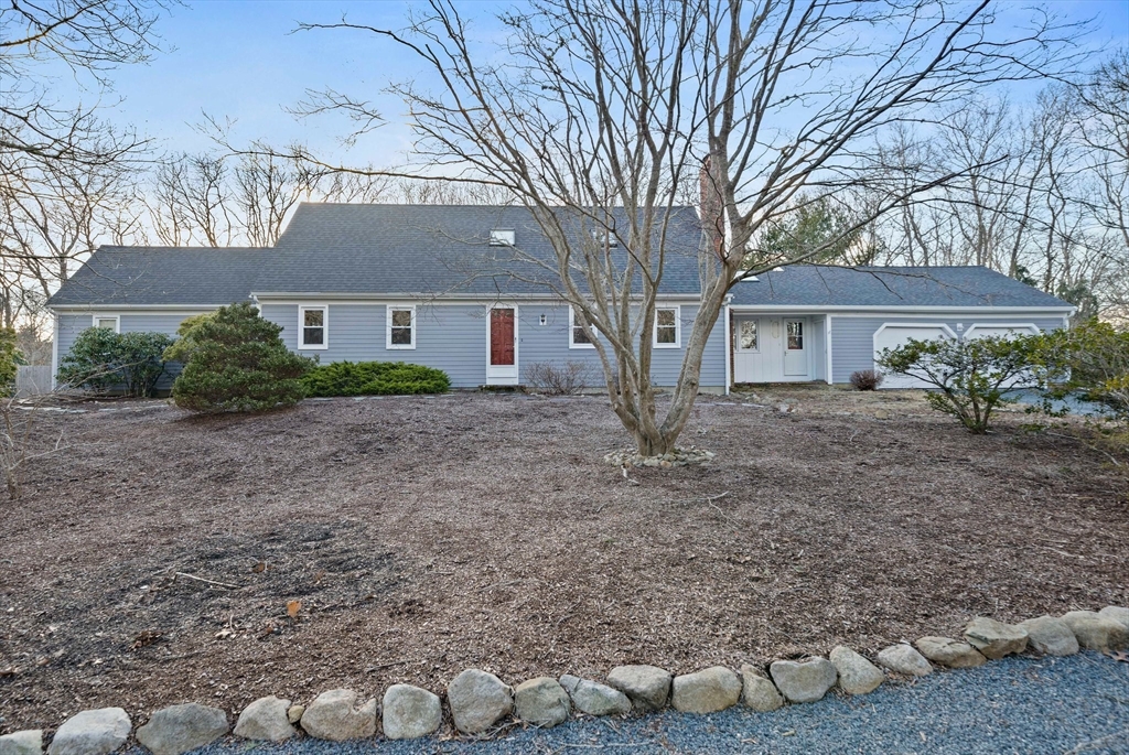 33 Oak Ridge Road Sandwich, MA 02537 - Photo 1 of 42 a view of a house with a yard