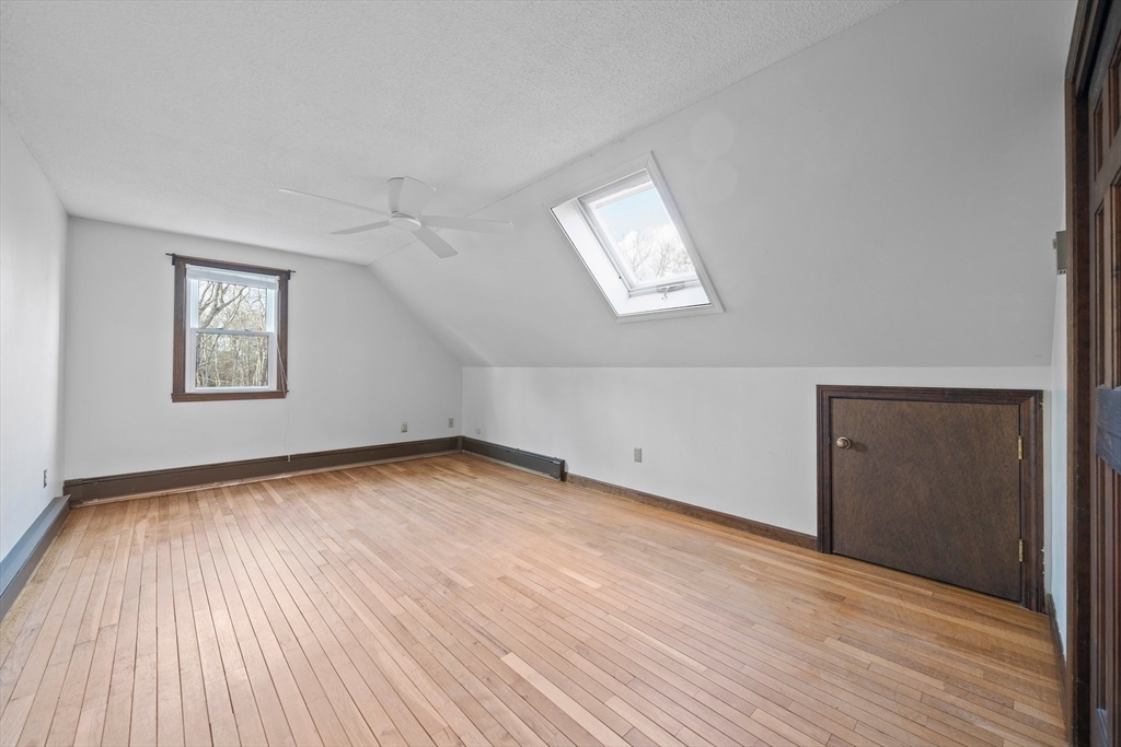 33 Oak Ridge Road Sandwich, MA 02537 - Photo 21 of 42 a view of empty room with wooden floor and fan