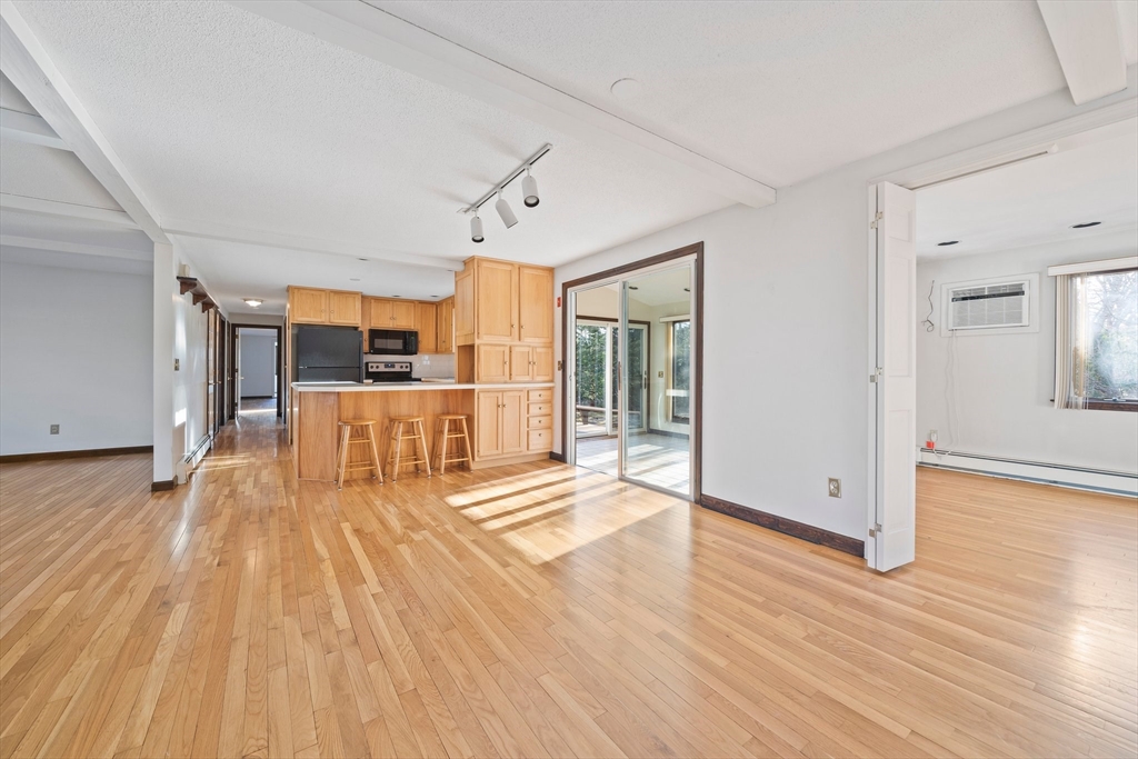 33 Oak Ridge Road Sandwich, MA 02537 - Photo 3 of 42 a view of empty room with wooden floor