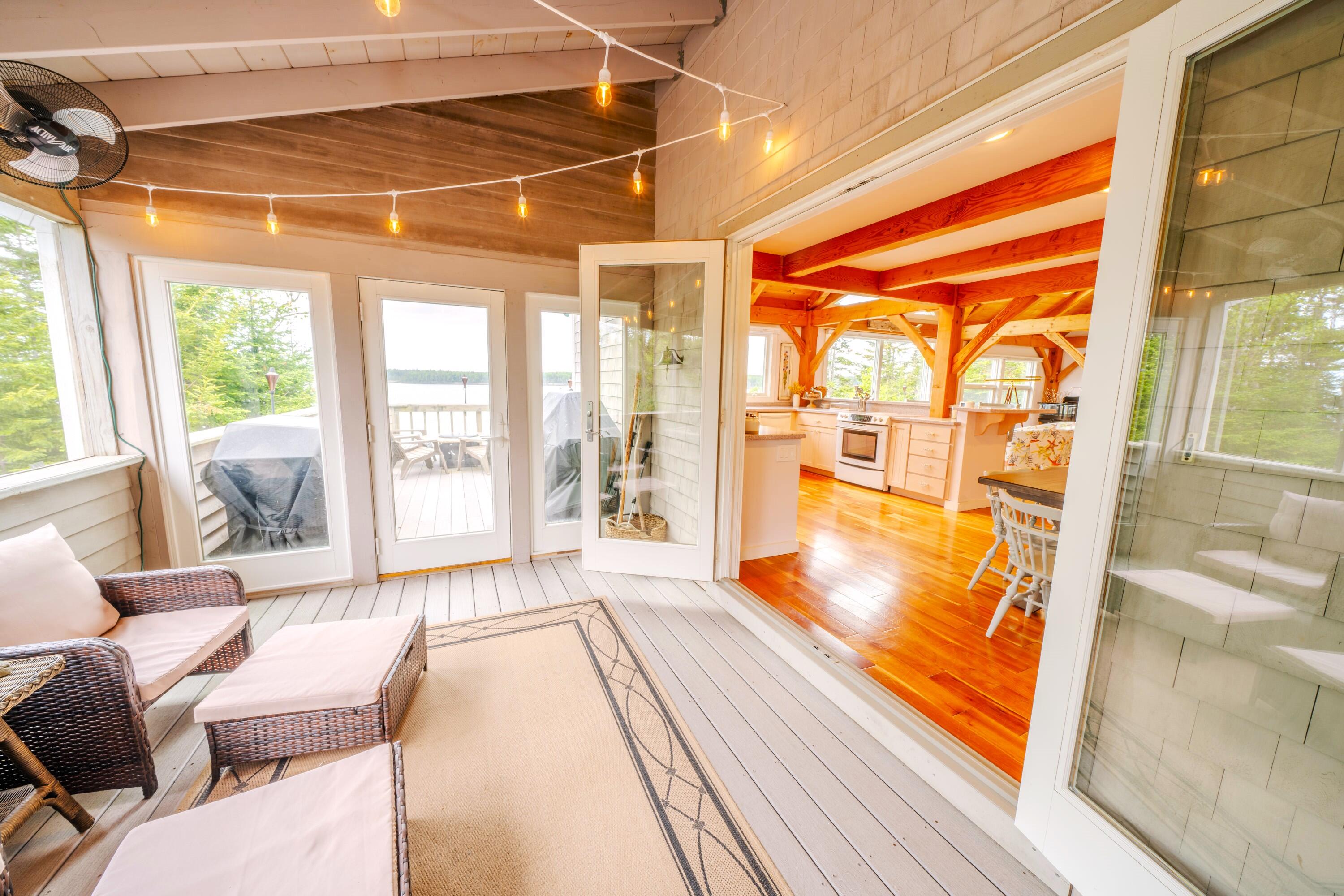 557 Yoho Head Road Machiasport, ME 04655 - Photo 38 of 136 X-Screened porch to kitchen-dining area