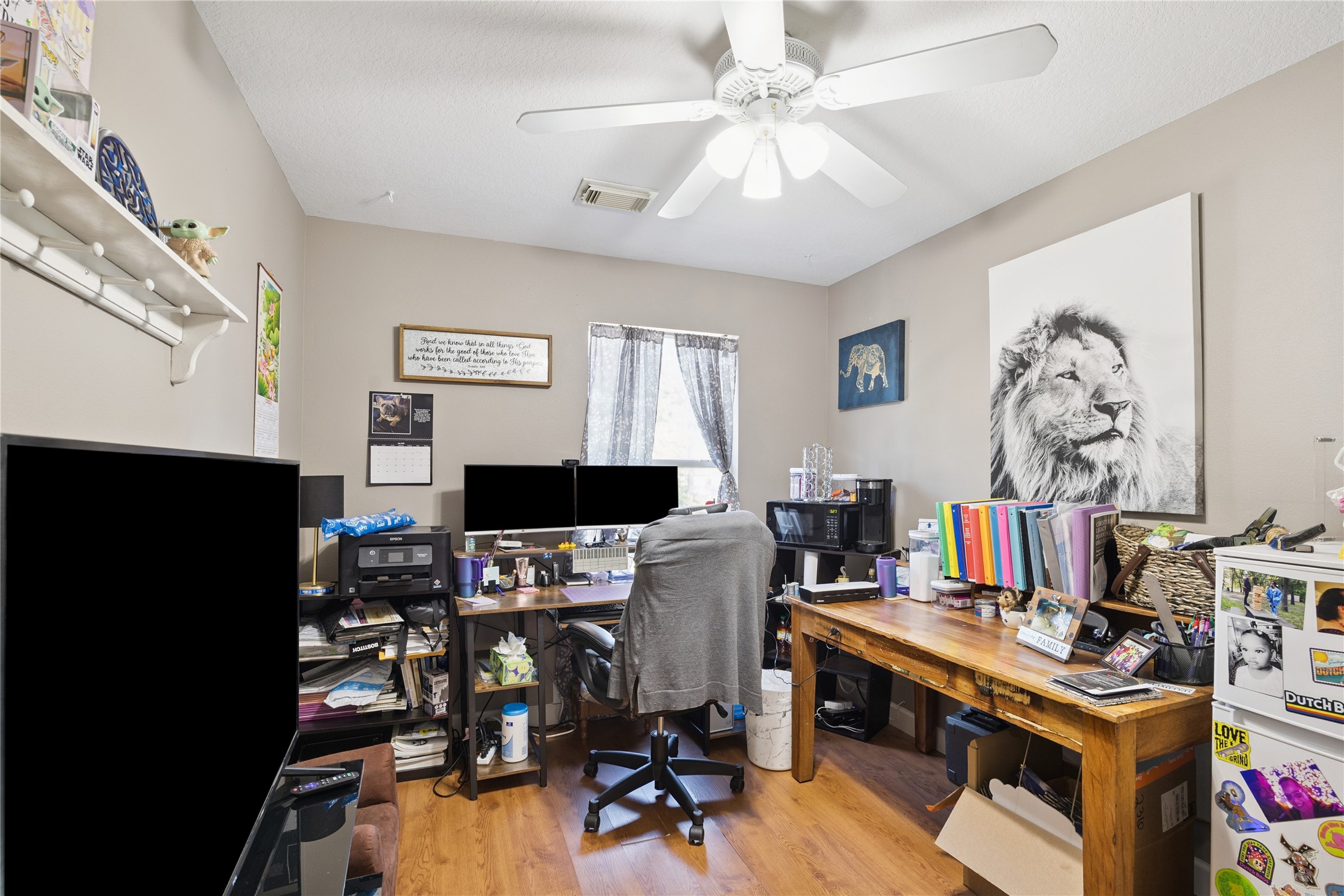 23634 Wildwood Green Way Spring, TX 77373 - Photo 9 of 14 a view of a workspace with furniture and a window