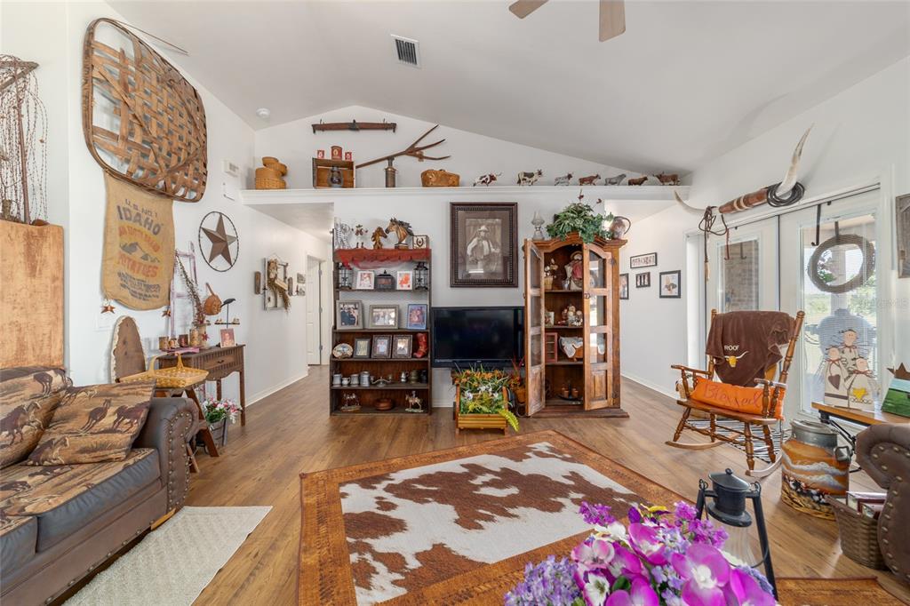 19355 Southwest 25th Place Dunnellon, FL 34431 - Photo 41 of 73 a bed room with a bed and a chair