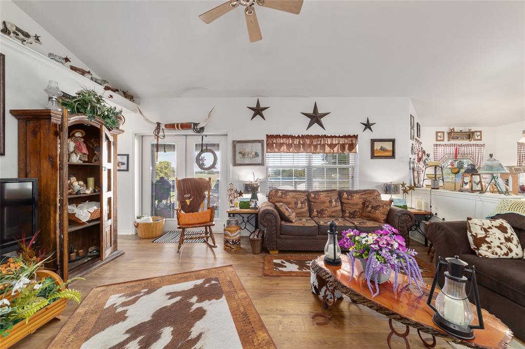 19355 Southwest 25th Place Dunnellon, FL 34431 - Photo 47 of 73 a living room with furniture and a flat screen tv