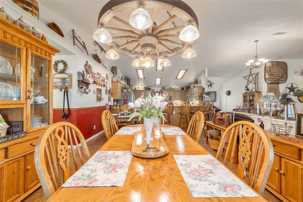 19355 Southwest 25th Place Dunnellon, FL 34431 - Photo 54 of 73 a view of a dining room and hall with furniture