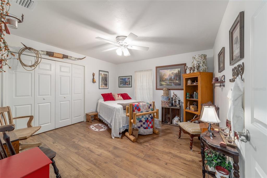 19355 Southwest 25th Place Dunnellon, FL 34431 - Photo 66 of 73 a bed room with a bed and a window
