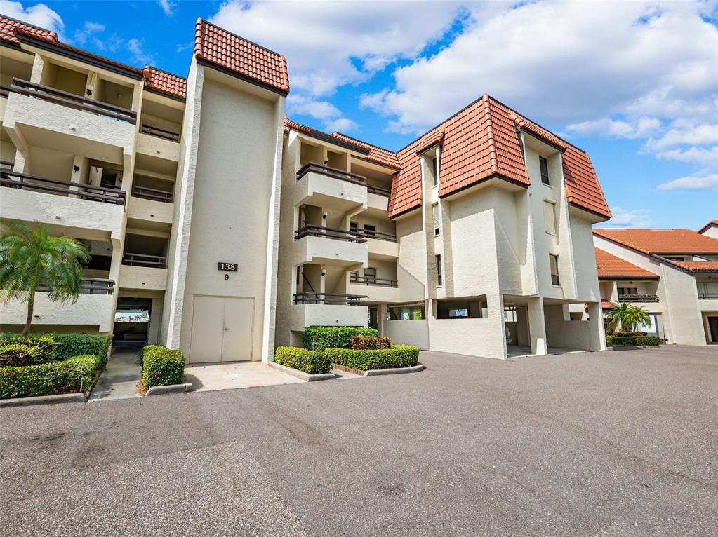 138 1st Street East, Unit 106 Tierra Verde, FL 33715 - Photo 35 of 62 a view of a street with buildings