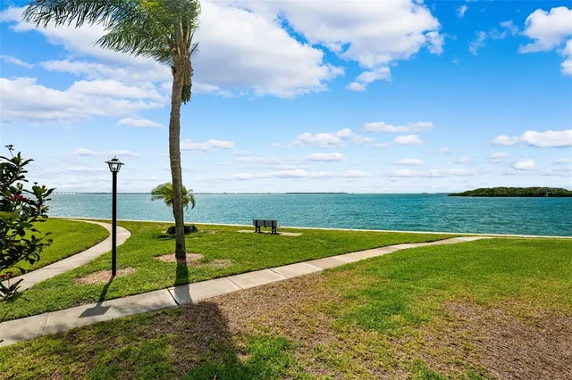 a view of a lake with a nearby beach