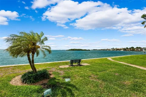 a view of a lake with a big yard