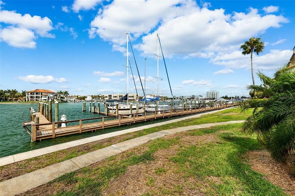 138 1st Street East, Unit 106 Tierra Verde, FL 33715 - Photo 46 of 62 a view of a lake with a nearby beach