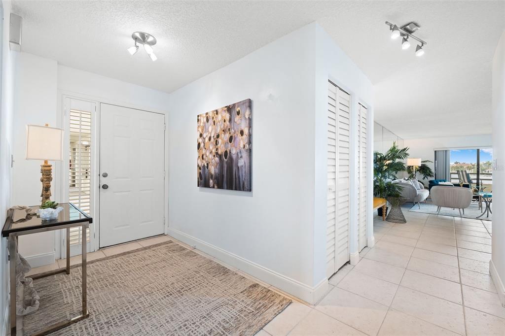 138 1st Street East, Unit 106 Tierra Verde, FL 33715 - Photo 5 of 62 a view of a livingroom with workspace and a window