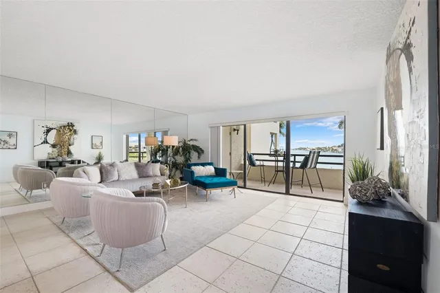 a living room with furniture and white walls