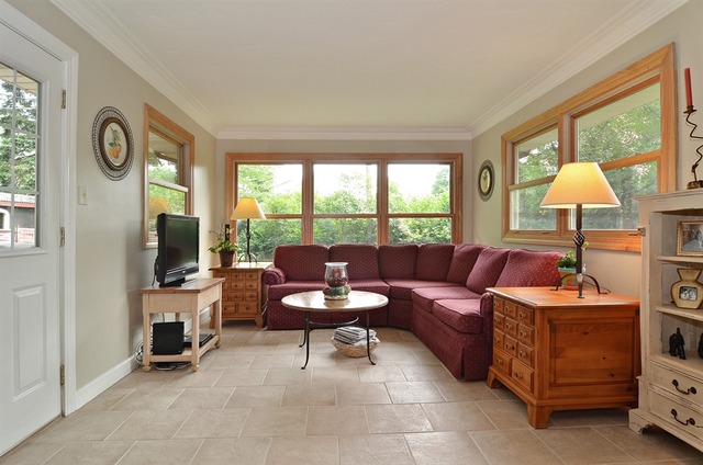 1341 South Knight Avenue Park Ridge, IL 60068 - Photo 5 of 10 a living room with furniture and a window