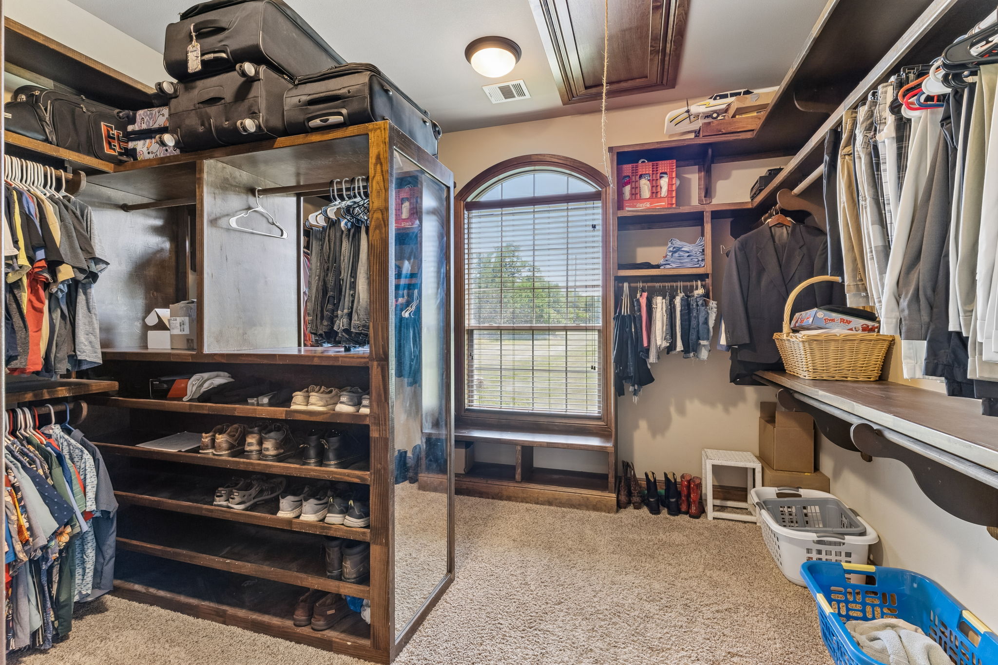 438 Patricia Road Georgetown, TX 78628 - Photo 20 of 36 Oversized primary closet w/ well thought out additions.