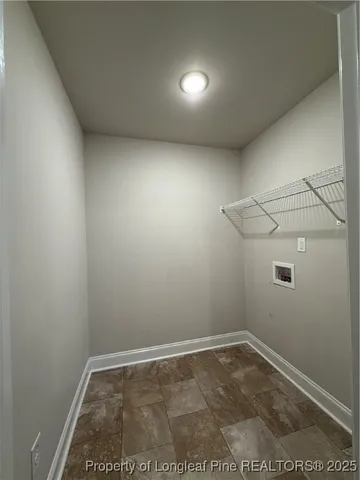 a view of a room with racks on the wall